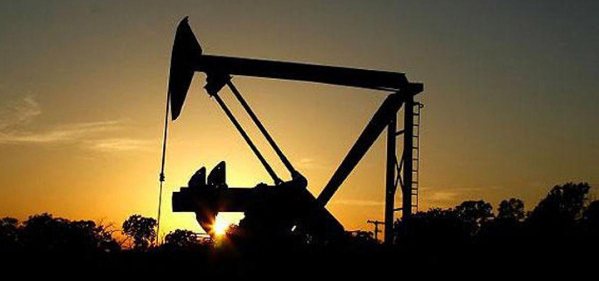 Oil prices drop on stronger US dollar